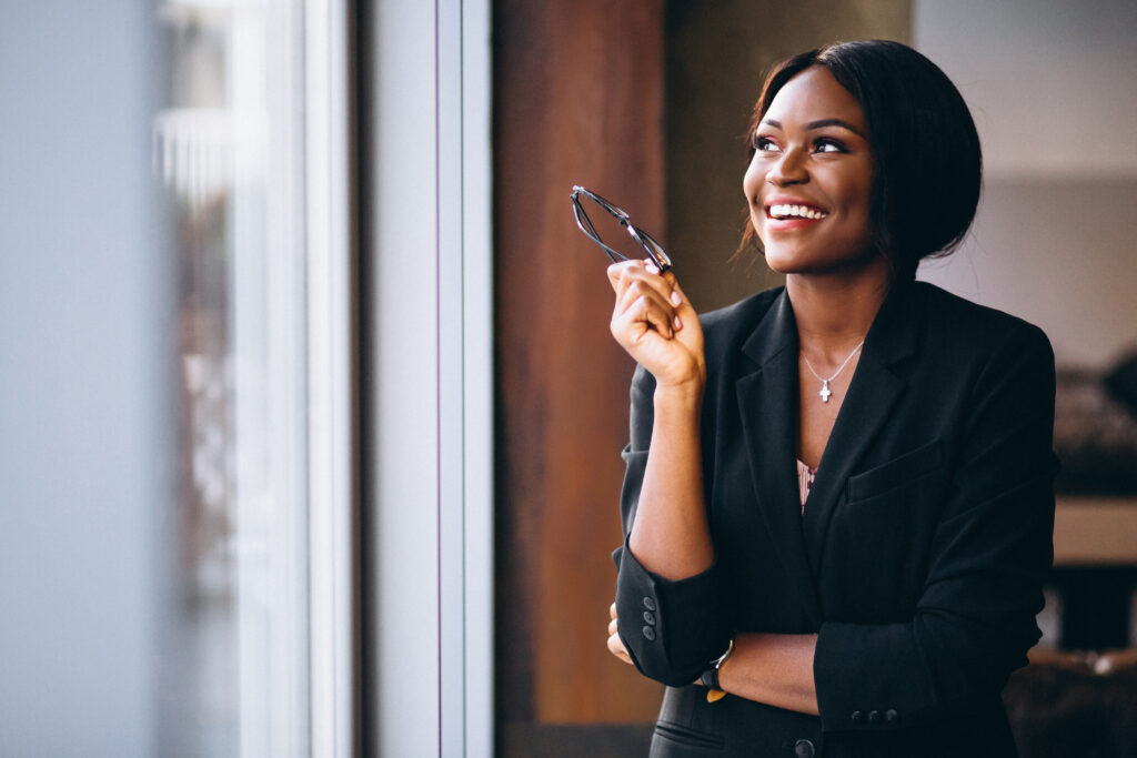 Home african american business woman by the window